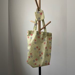 Plastic grocery bag with cute miniature bag